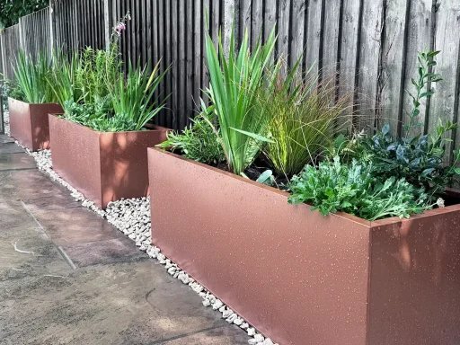 Coreten Planters, planted up by Hortus Viridis. Seer Green garden.